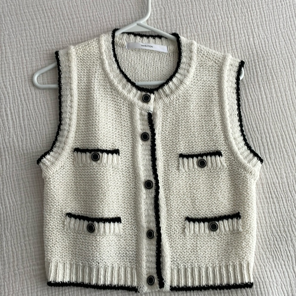 Push button sleeveless cardigan. Size small perfect condition.
